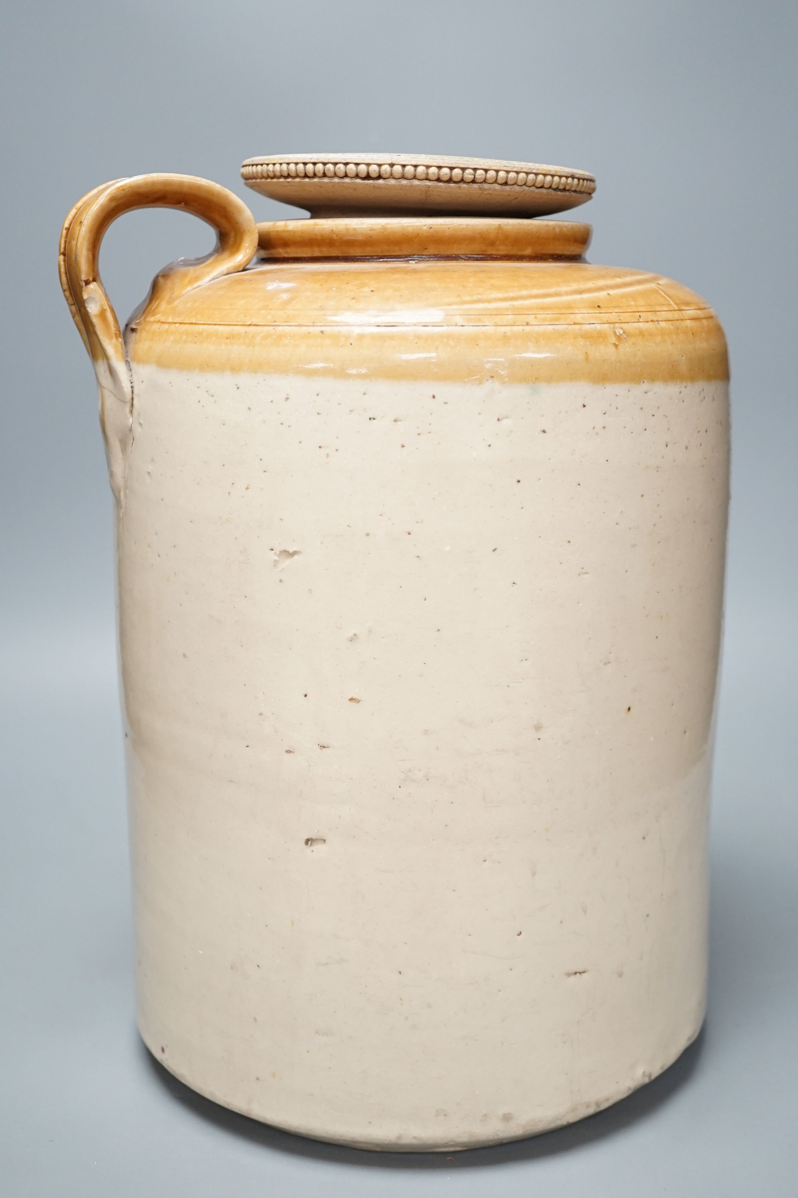 A Grosvenor Glasgow stoneware beer, storage jar, 37 cms high.